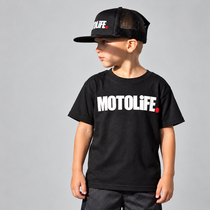 Black MOTOLiFE kids tee worn by a child in a gray studio setting; hat sold separately