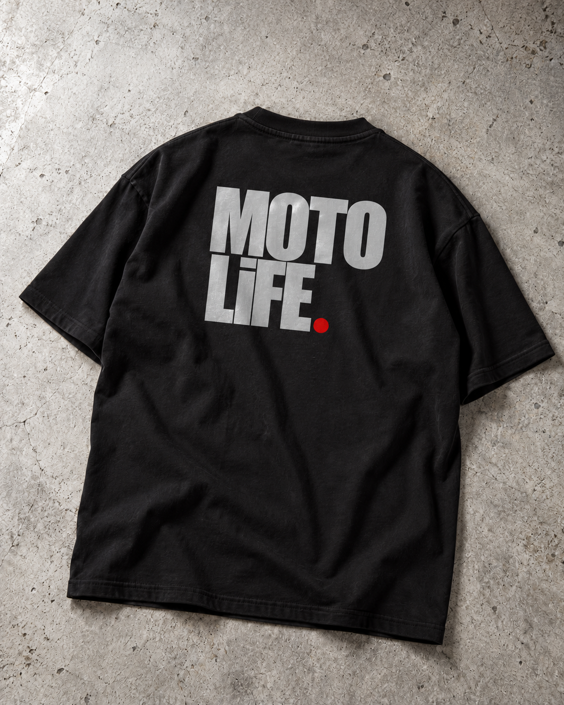 V2 black short-sleeve tee back flat lay with large stacked silver reflective MOTO LiFE print and red period.