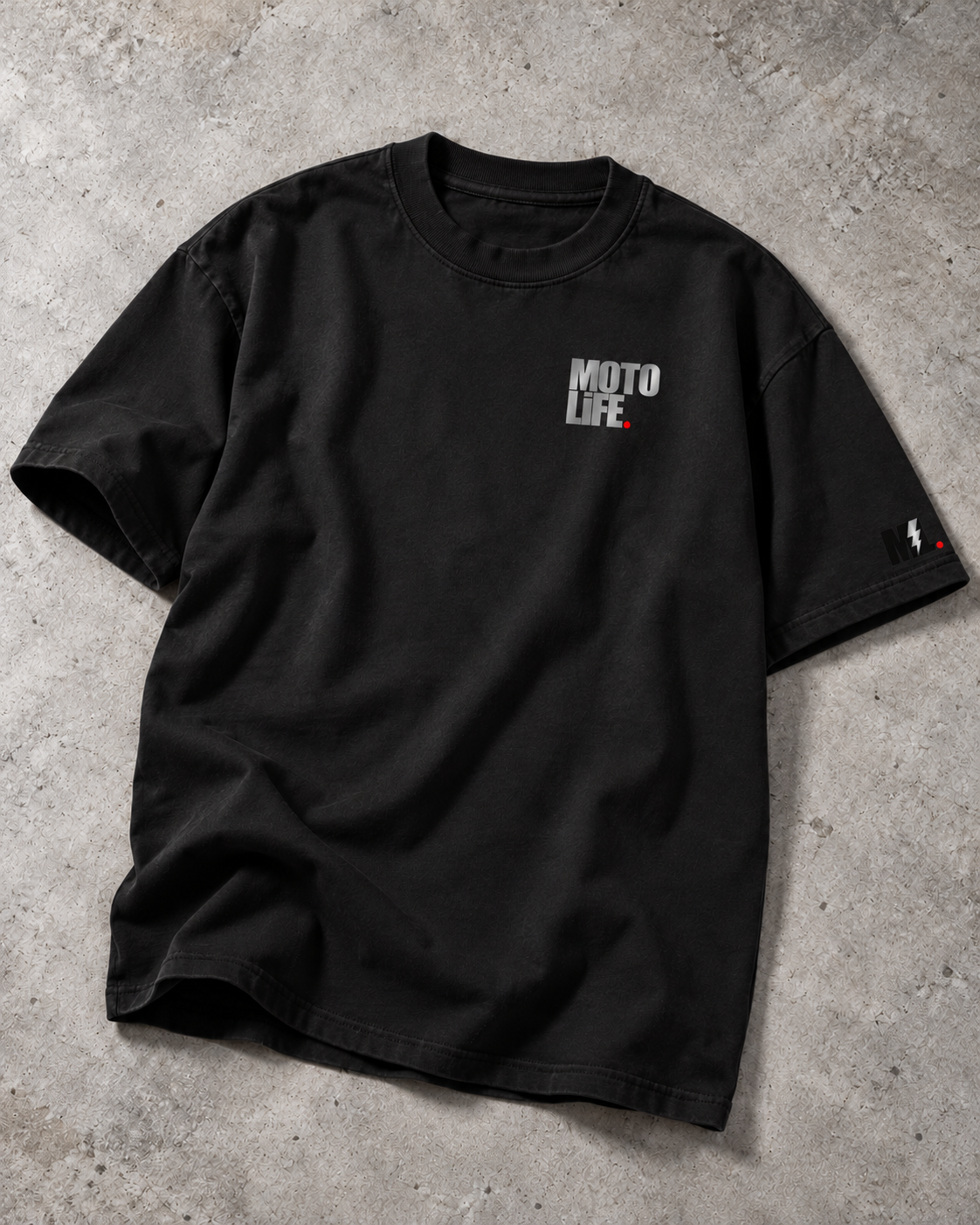 V2 black heavyweight short-sleeve tee front flat lay with small stacked reflective left-chest logo and sleeve lightning bolt.