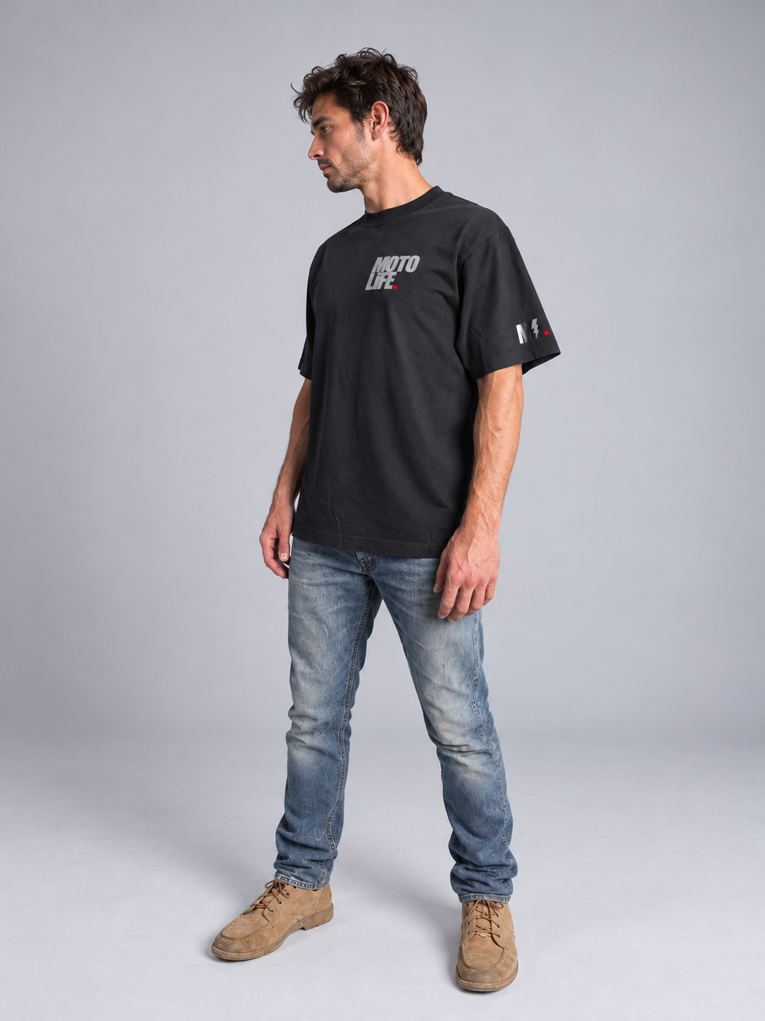 V2 short-sleeve tee studio side view showing stacked reflective chest branding and sleeve mark.